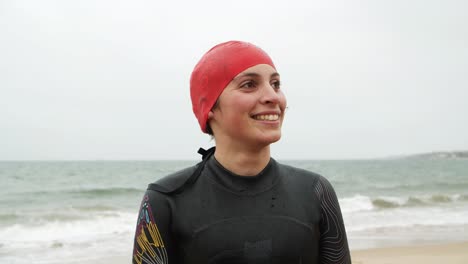 portrait of female swimmer smiling at camera