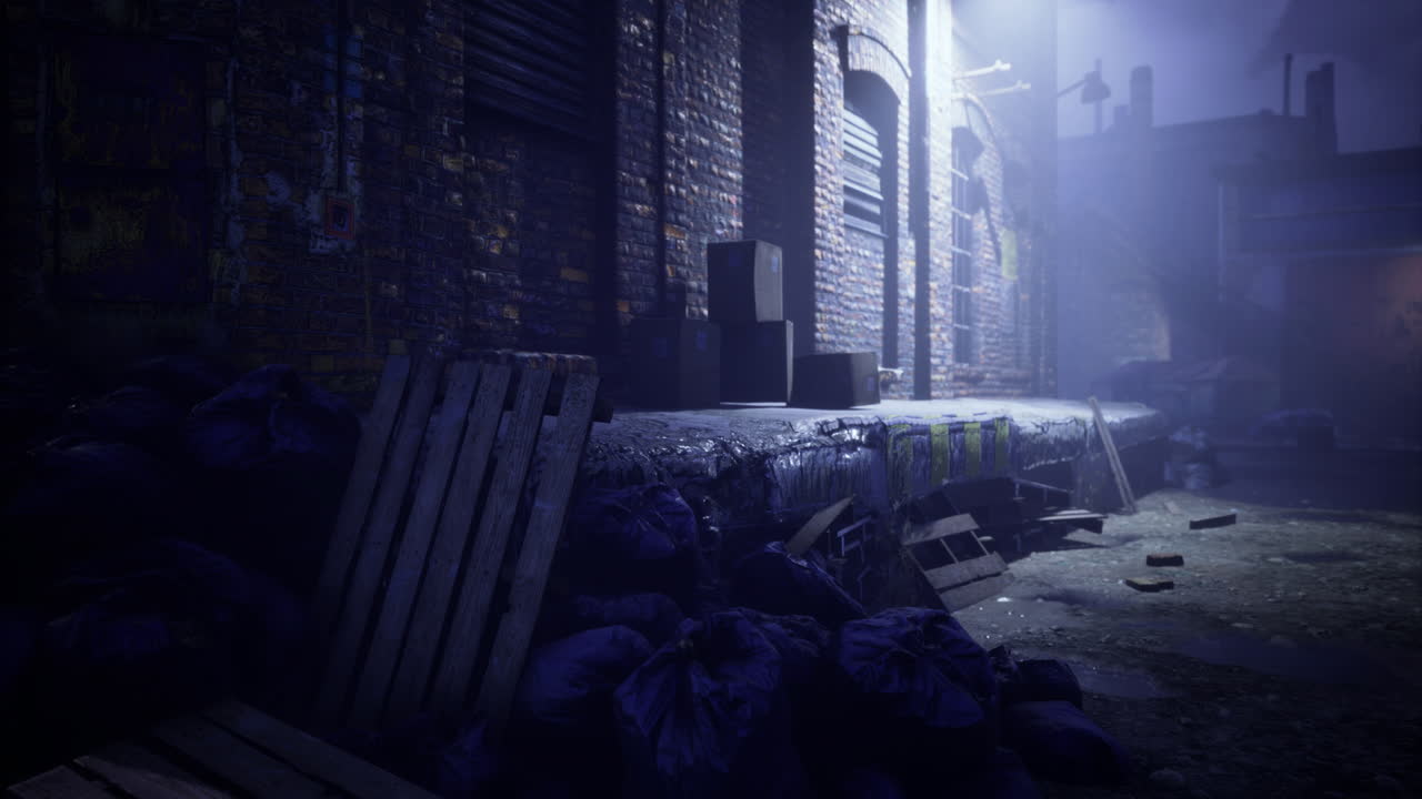 Dark alleyway filled with trash and wooden pallets in a city at night