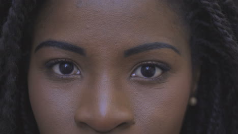 Closeup-shot-of-African-American-woman-looking-at-camera.