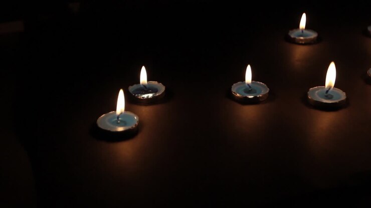 Candele Accese Sfondo Nero Slider 1.
