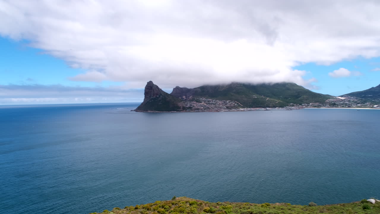 Panoramic pan shot over Hout Bay from Chapman's Peak viewpoint