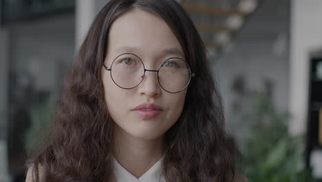 portrait of a woman wearing glasses