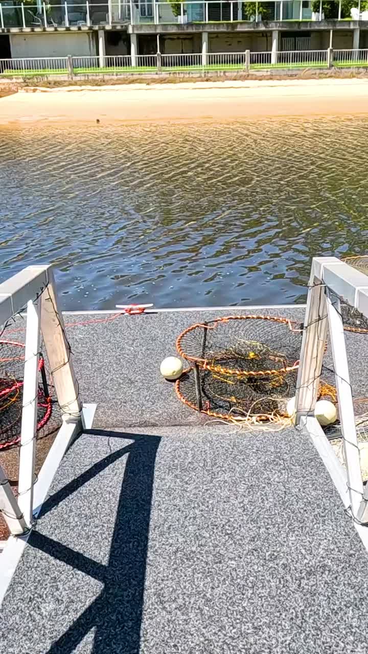 Walking along a pier towards the water