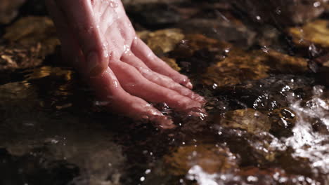 Hand-trying-to-take-water