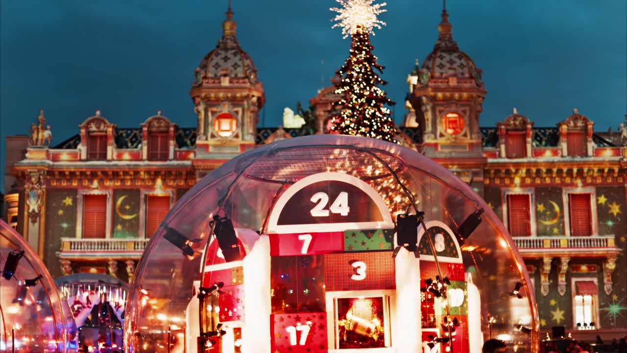 Monte Carlo, Monaco - December 14, 2024: Big Christmas advent calendar decorations in bubbles in the courtyard of the Monte Carlo Casino
