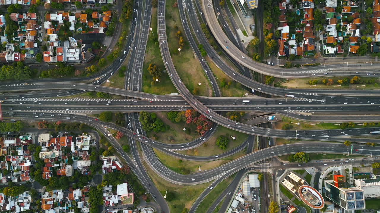 Aerial View of Busy Highway Interchange with City Traffic