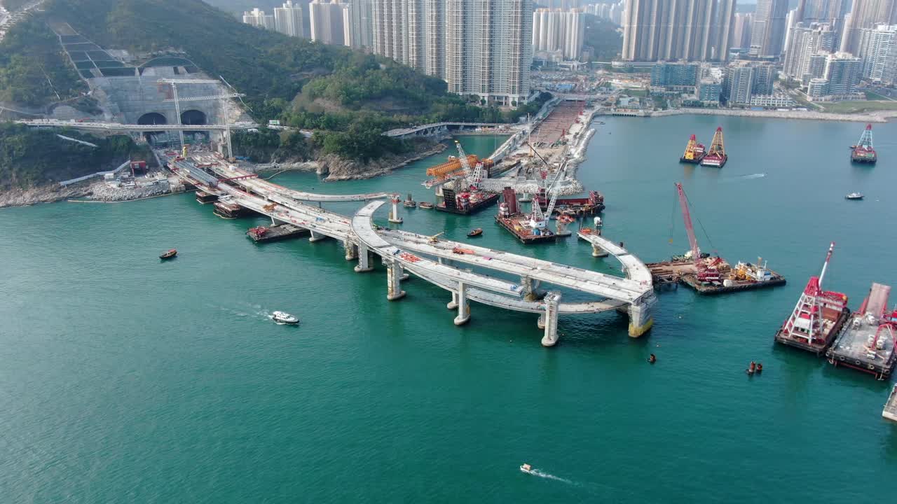 proyecto de construcción del enlace cruzado de la bahía de hong kong, un puente doble de dos carriles que conecta el túnel tseung kwan o lam tin con la carretera wan po, vista aérea