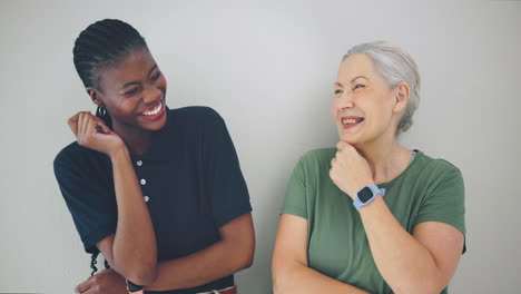 senior woman, laughing or happy caregiver talking