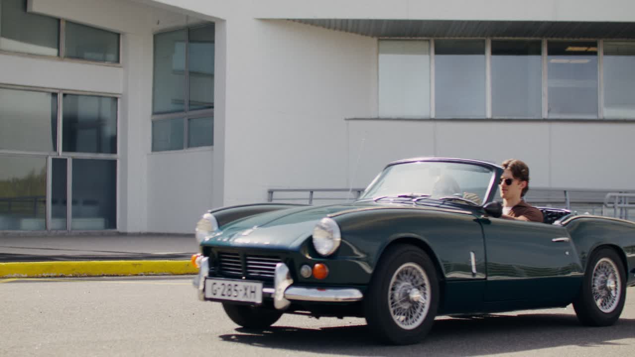 Couple in a Classic Convertible Car