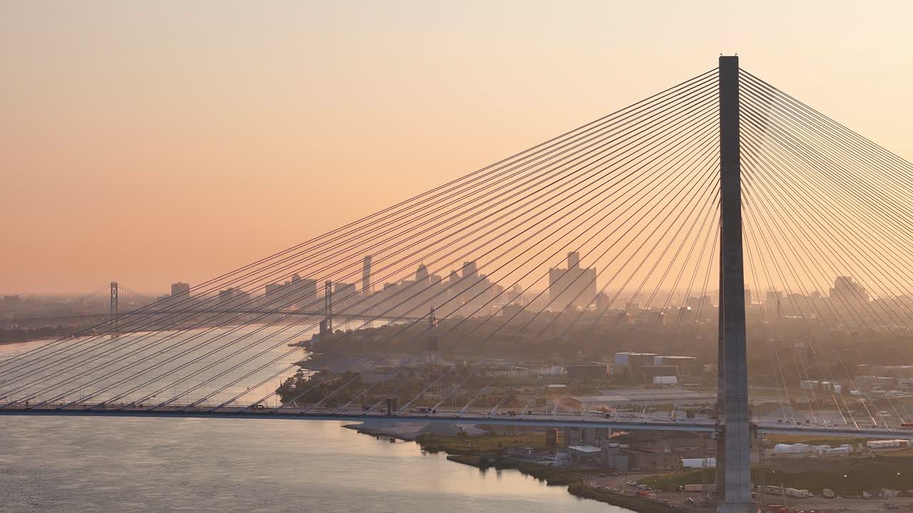 Gordie Howe Bridge Over Detroit River at Sunset With Downtown Skyline in Background