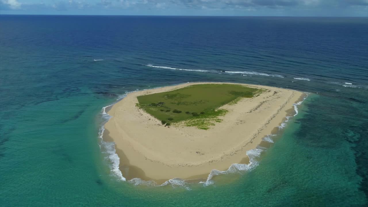 Aerial circling of island near Montecristo bay. Dominican Republic