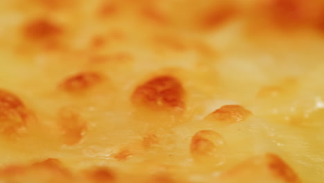 close-up of melted cheese topping