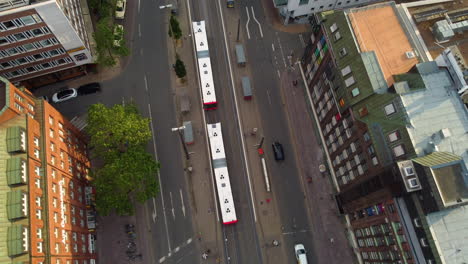 trams at the transit stop on the road in bremen city, germany