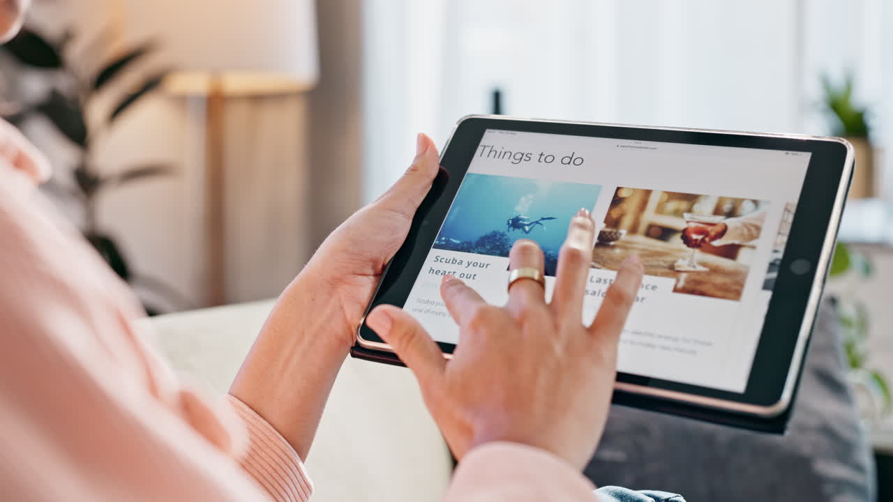 Person using tablet for travel planning