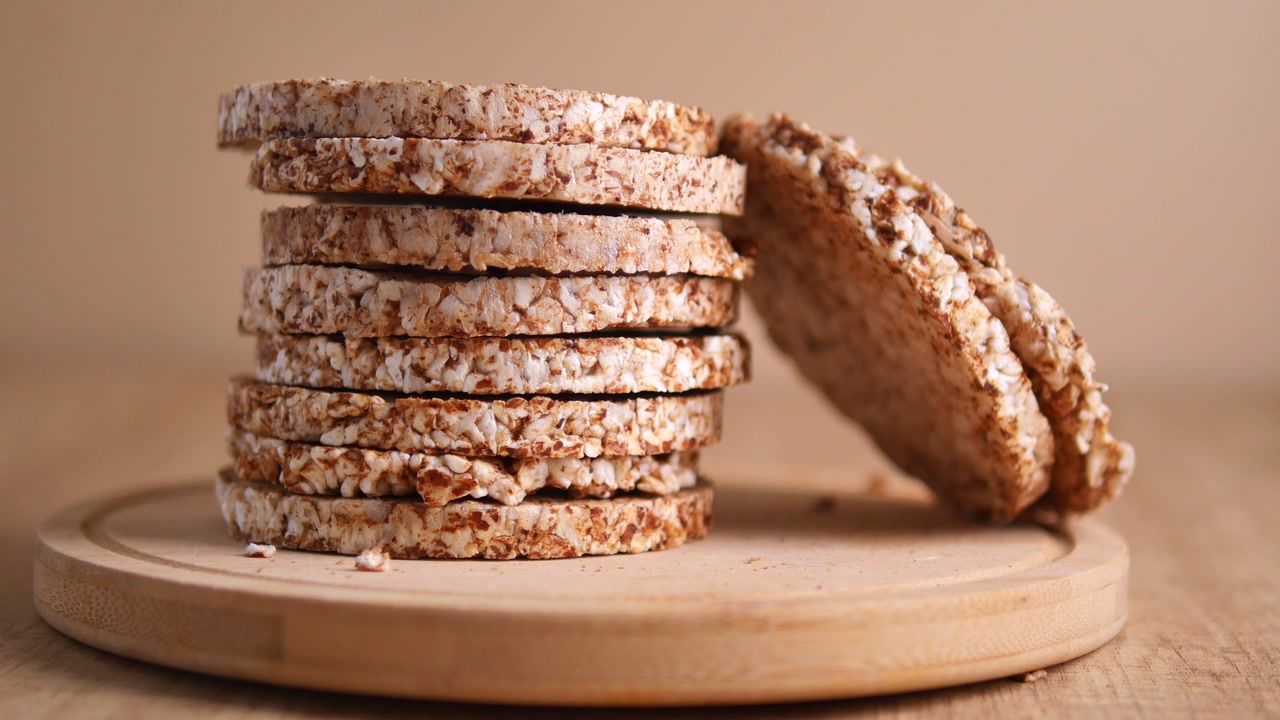 Stack of Healthy Rice Cakes on a Wooden Board