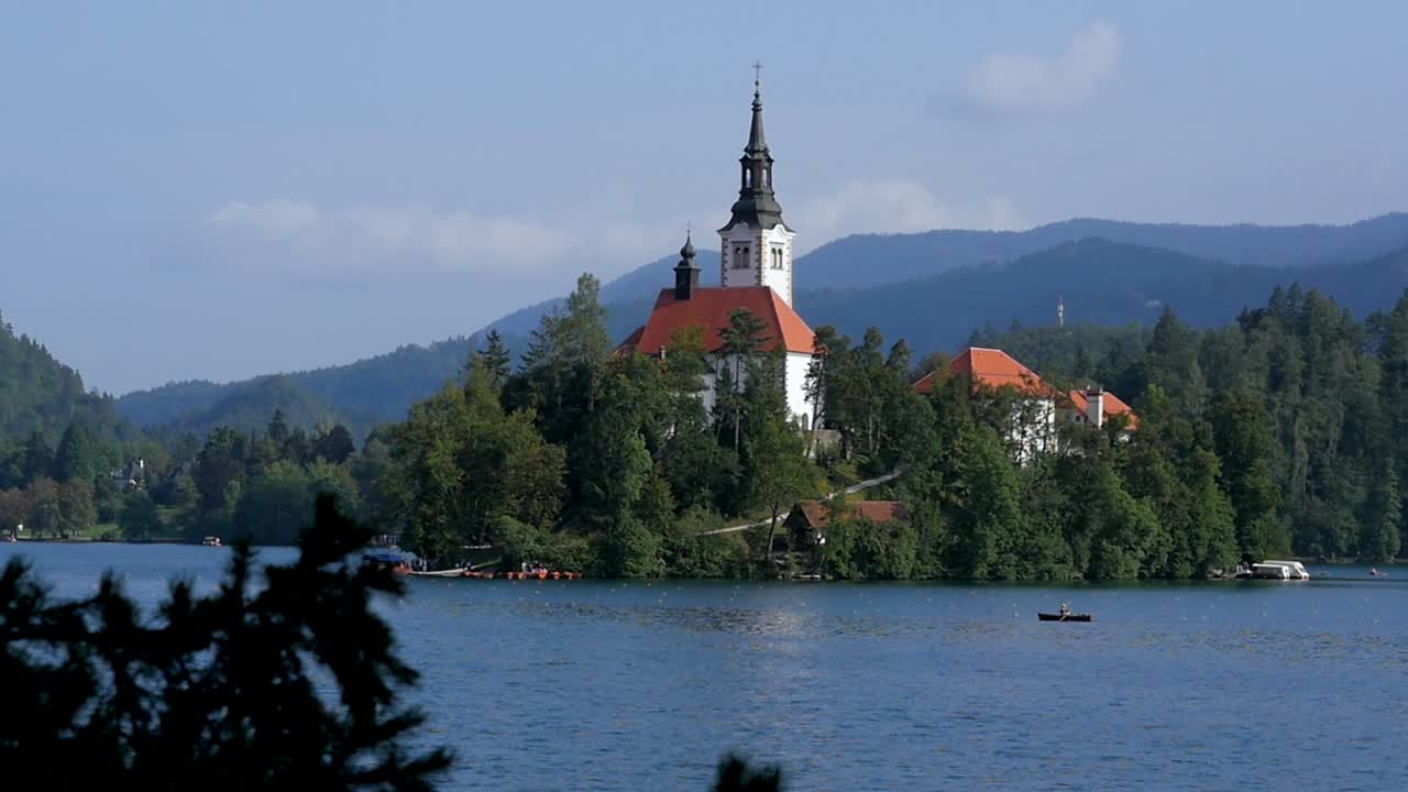 Slow motion landscape shot of Lake Bled Island church in Julian Alps Tourism Slovenia Ljubljana Europe 1920x1080 HD