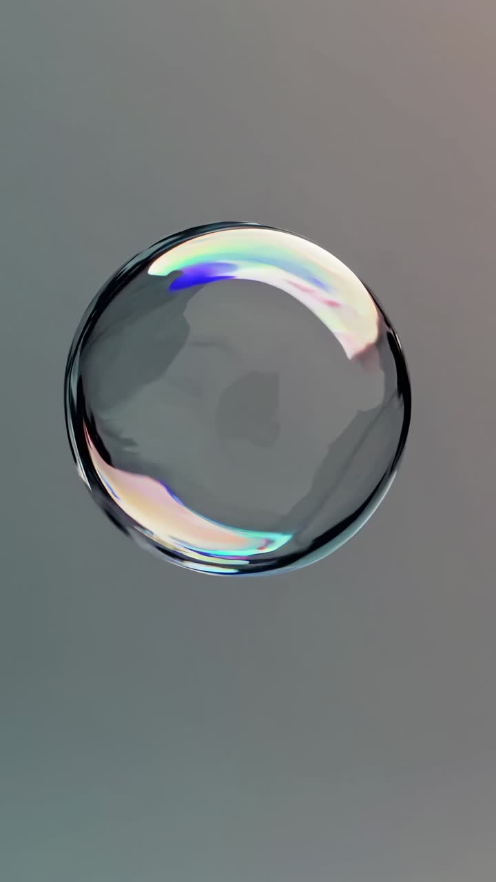 Un concept video minimalista che mostra una singola bolla di sapone che fluttua su uno sfondo con gradiente delicato