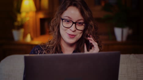 Portrait-Of-Businesswoman-Working-On-Laptop-While-Talking-On-Mobile-Phone-5