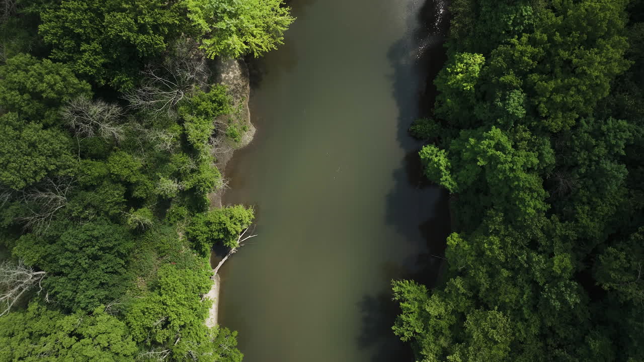 Bird's Eye View Over Calm River Surrounded With Lush Vegetation In Oronoco, Minnesota, USA - drone shot