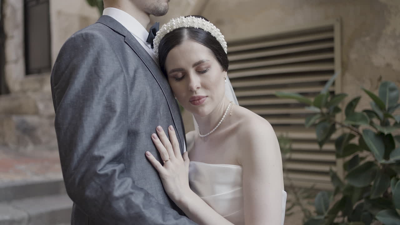 Couple in love, bride leans on groom's shoulder