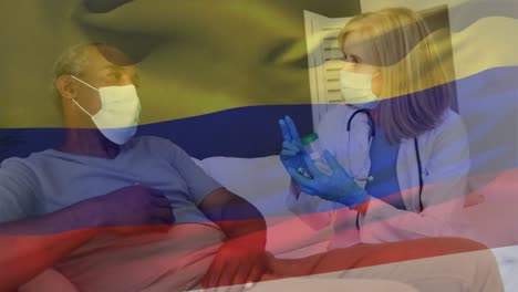 Animation-of-flag-of-colombia-over-caucasian-female-doctor-talking-with-patient