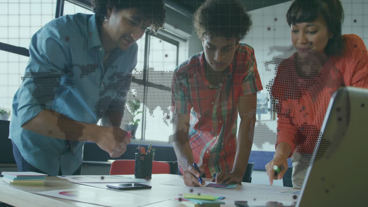Business team annotating charts on table, man writing initiating animated data highlights