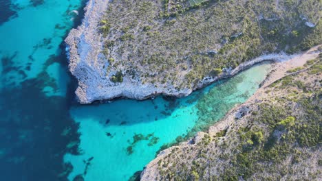 experience the breathtaking beauty of cala varques in porto cristo, majorca. clear turquoise waters and unspoiled nature create the perfect setting for relaxation and adventure.