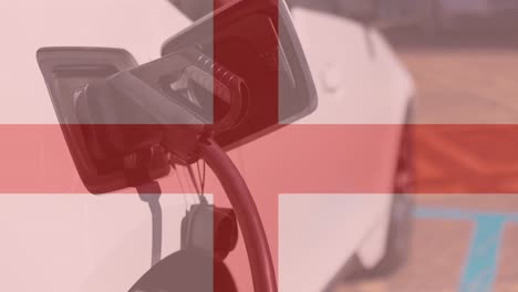 bandera de gran bretaña sobre la carga de automóviles eléctricos
