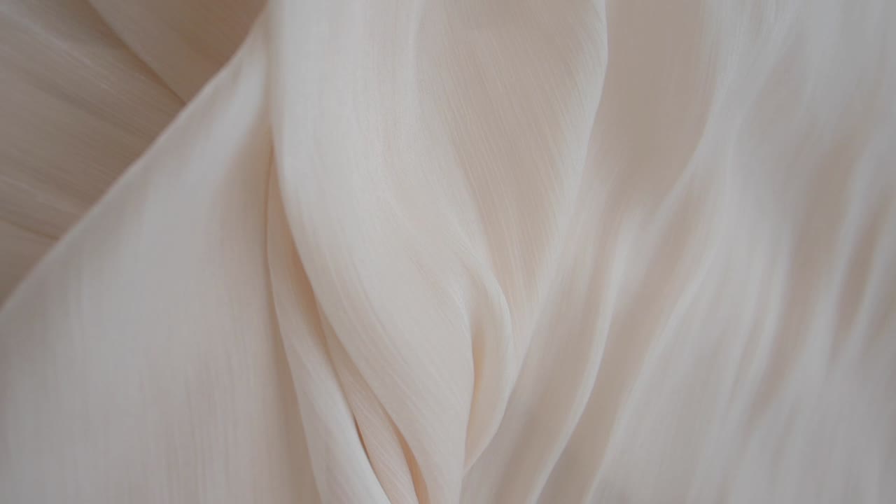 Soft Flowing Cream Fabric Drapes Background