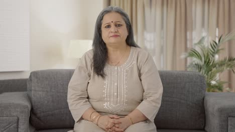 Serious-Indian-old-woman-looking-at-the-camera