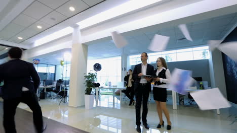 businessman exulting for his success. happy business people celebrating success at company