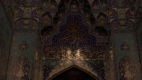 beautiful artwork on interior of a mosque in oman - static low angle