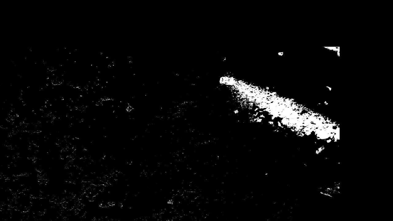 Particelle di polvere bianca astratta in movimento su sfondo nero