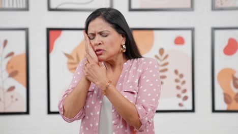 modern indian woman having tooth pain