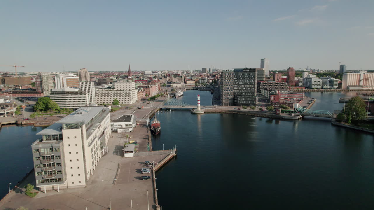 Drone getting closer to Malmö city centre, summer, aerial view