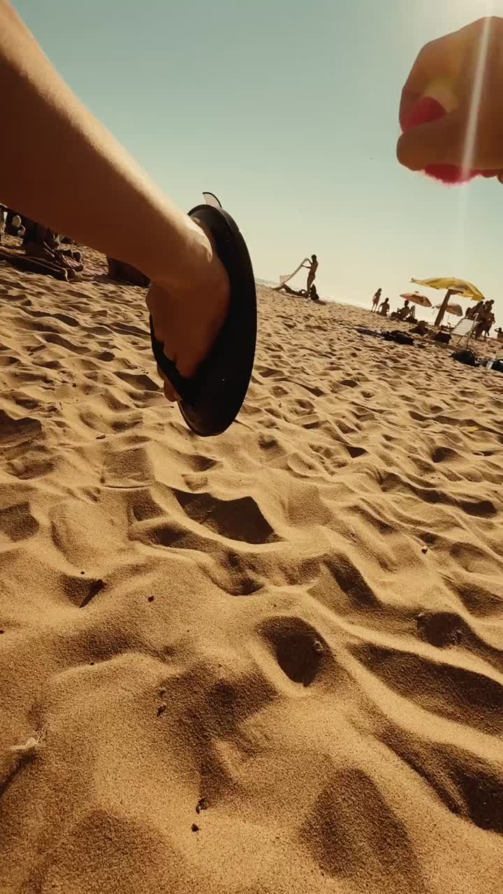 Beach scene with people and sand