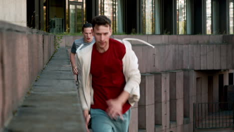 men doing parkour on the street