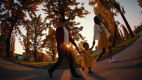 family walking together in autumn