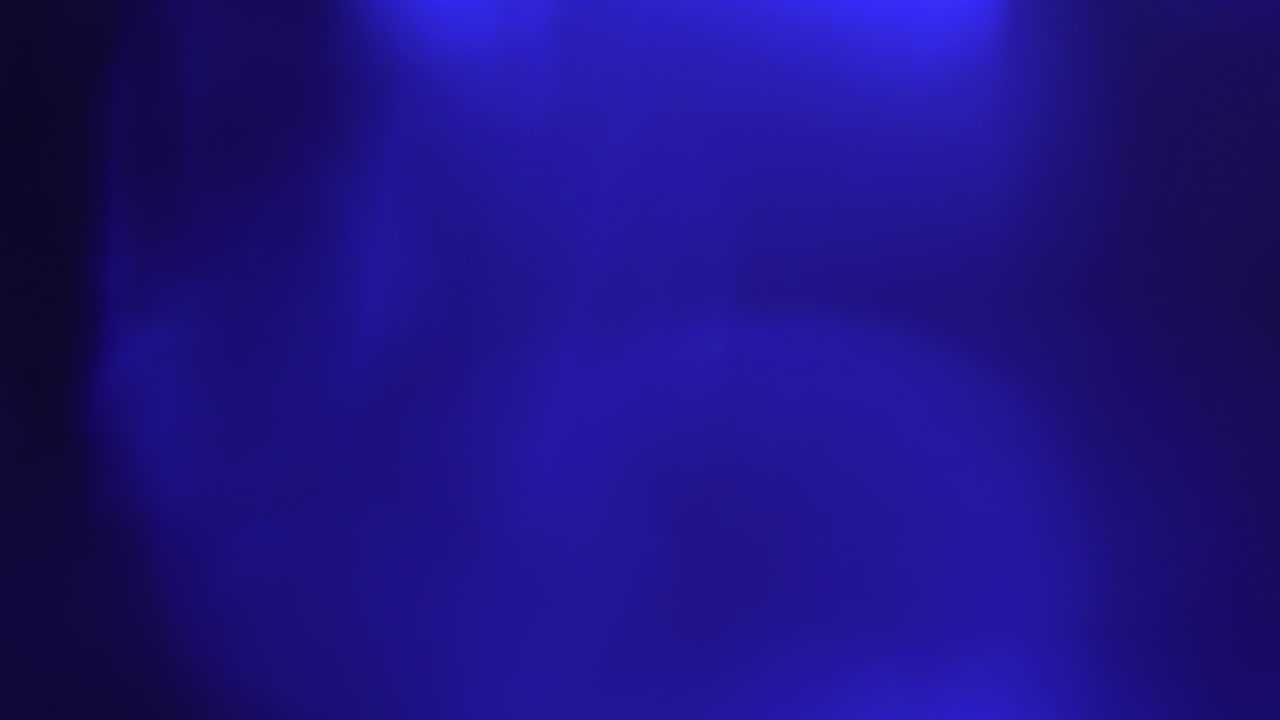 Featuring a captivating array of blue lens flares and bokeh effects