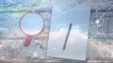 Animation of network of connections over cup of coffee and notebook