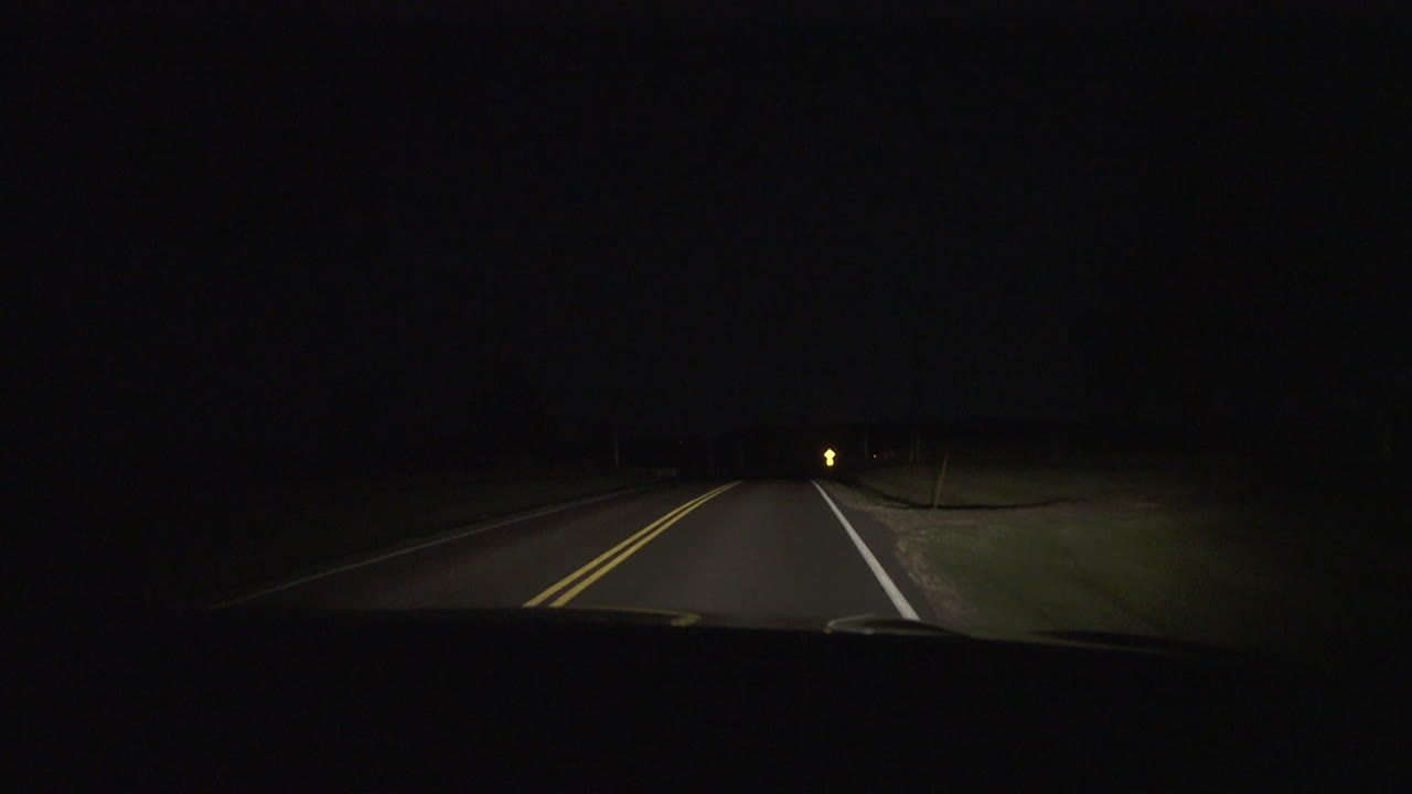 Passenger POV On Empty Country Road At Night