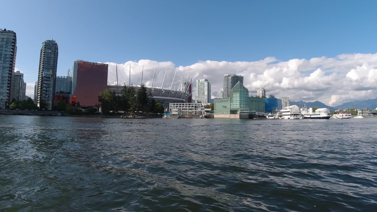 Ignorant to COVID-19 Restriction young adults party drunk suntanning on a luxury yacht out of Science World headed to English Bay in False Creek Vancouver during a family day long weekend in BC Canada