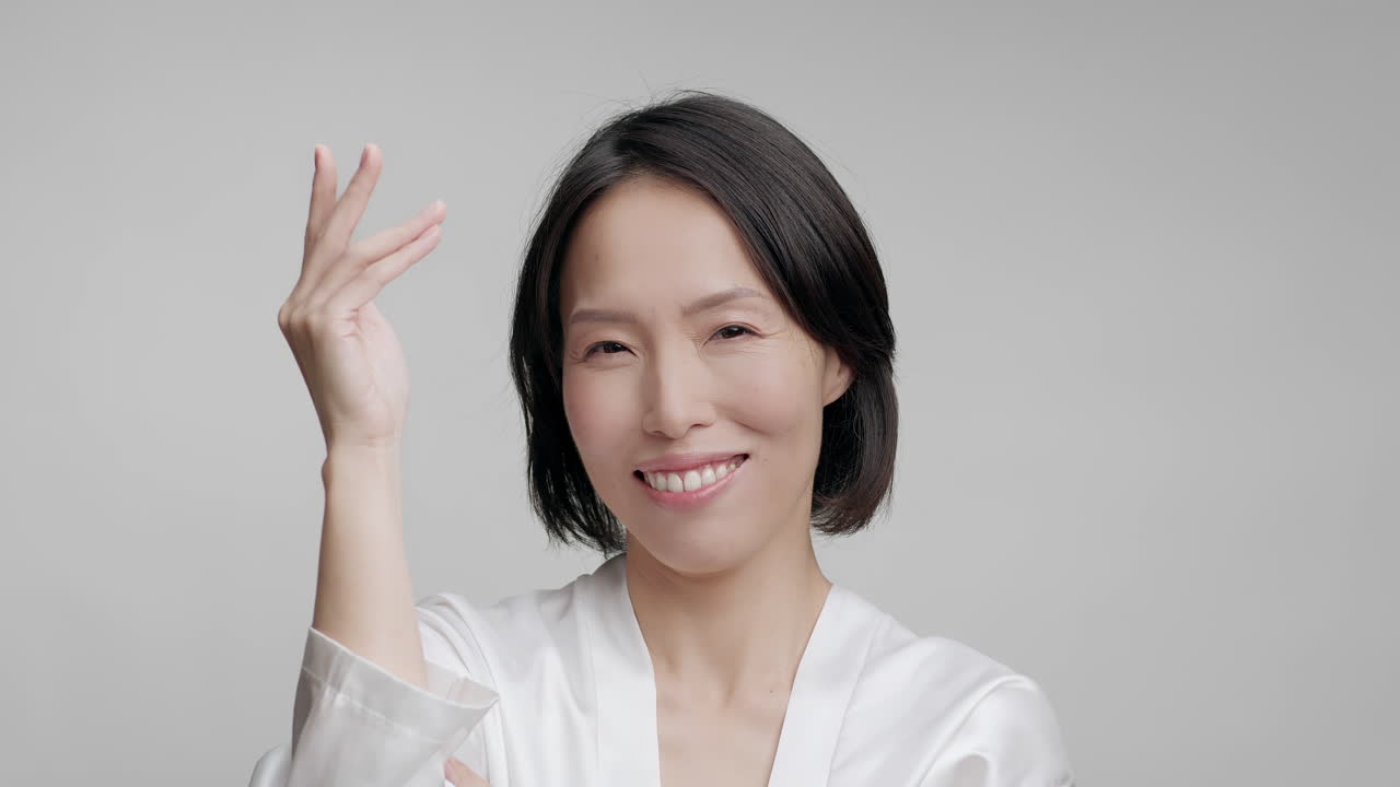 Smiling Woman in White Robe