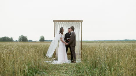 happy couple at the altar