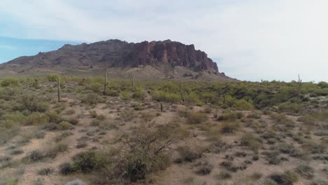 aerial - drone pan shot of desert mountain