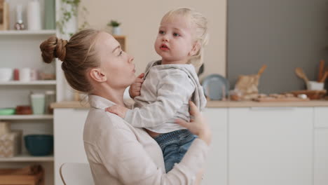 Mother Calming Down Upset Toddler