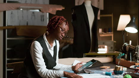 black woman in the tailor shop