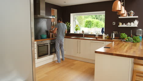 man dancing in kitchen