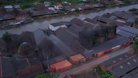 Aerial-view-of-brick-kilns-and-canal-in-Vinh-Long-in-the-Mekong-Delta,-Vietnam