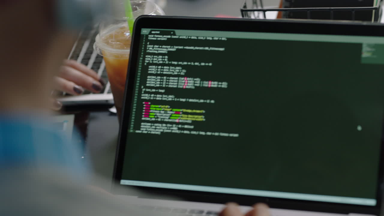 close up hands engineers developing software app using digital laptop computer typing code on screen programmers coding internet security system designing artificial intelligence project in office